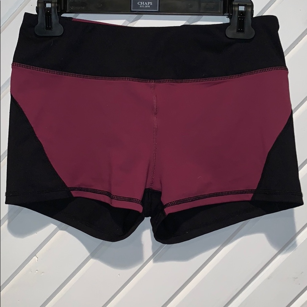 Black and purple spandex shorts